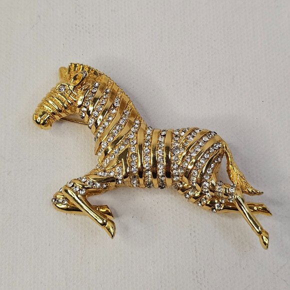 Oleg Cassini 1964 Gold Tone Zebra Horse Brooch Clear Rhinestone Marked Pin VTG - Picture 1 of 7